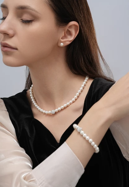 Leslii Armband Glitzer Perlen-Armband Muschelkern-Perlen Strass-Kugel dehnbar Weiß Rabatt