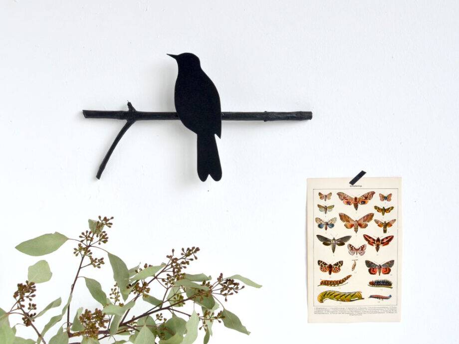 Renna Deluxe Amsel in Fraktur auf dem Ast Fabrikverkauf