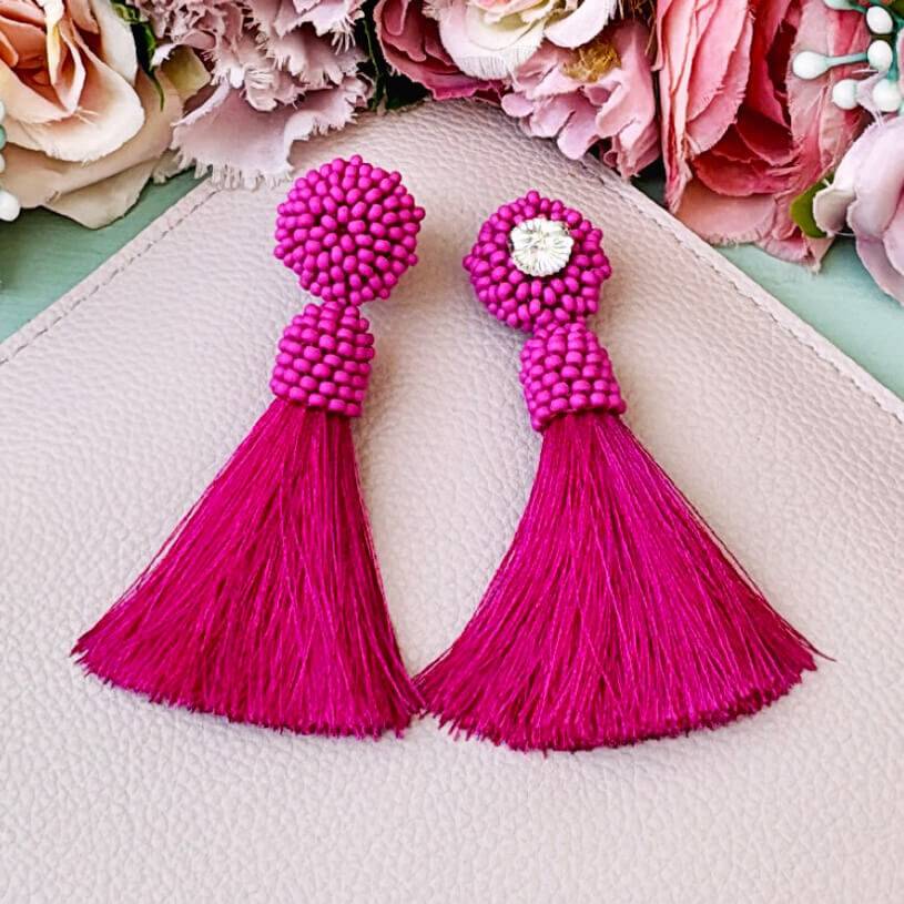 SchwesterSchwester Auffällige Perlen-Quastenohrringe in Pink Meist gekauft